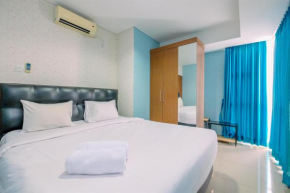 Comfortable and Homey 2BR Apartment at Royal Olive Residence By Travelio